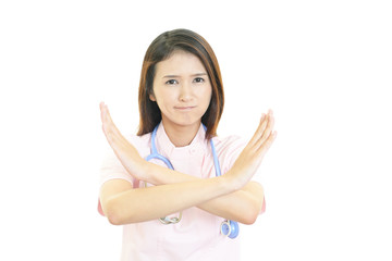 禁止の意思表示をする看護師