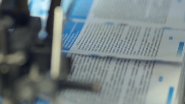 The process of printing colored  booklets in printing house