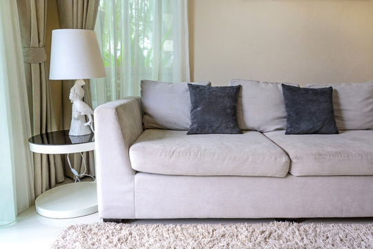 Sofa with pillows in livingroom