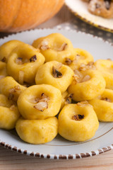 Polish noodles ( kluski slaskie ) with potatoe and pumpkin