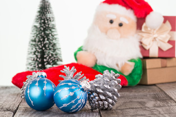 Fototapeta na wymiar Christmas baubles and Santa Claus close-up