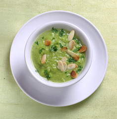 Pea soup with toasted almonds - obrazy, fototapety, plakaty