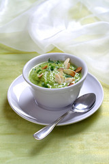 Pea soup with toasted almonds