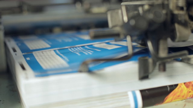 The machine works at the printing house