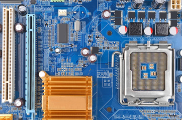 Printed computer motherboard with microcircuit, close up, DOF