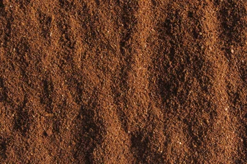 Deurstickers coffee ground texture © TPhotography