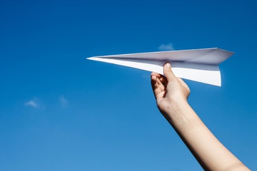 Paper airplane and blue sky.