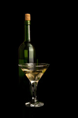 glass and a bottle of wine