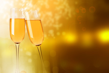 Two wine glasses with champagne on the blurred background