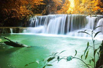 Zelfklevend Fotobehang Beautiful waterfall in autumn forest © totojang1977