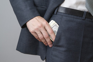 Businessman with money in studio