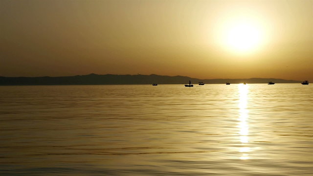 Scenic view at small boats on calm sea