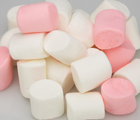 Pile of marshmallow , isolated on light background