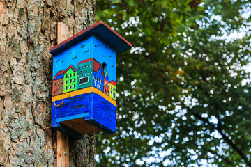 Colorful birdhouse canal houses view side