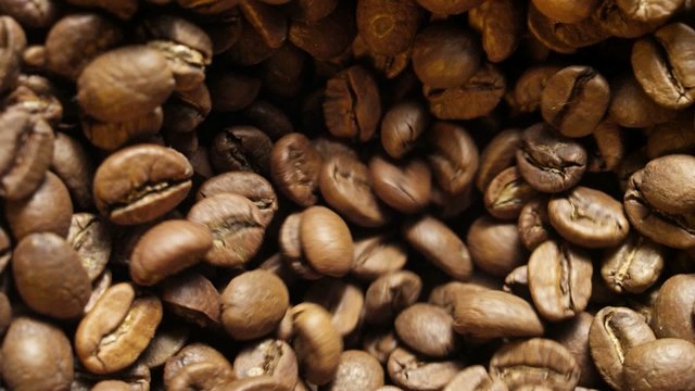 Coffee beans rotating top view