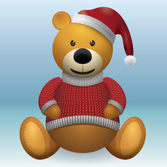 Teddy bear brown in red sweater and red hat