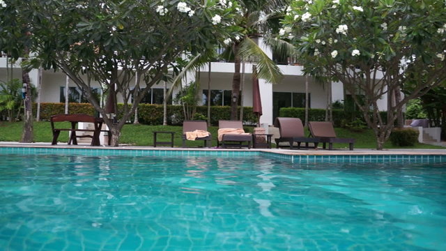 swimming pool in tropical hotel