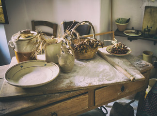 Table with ingredients and kitchen tools.