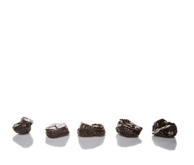 Dried plum or prune over white background