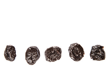 Dried plum or prune over white background
