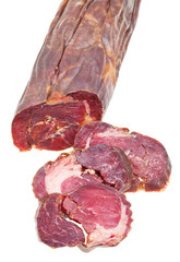 sliced horse meat sausage kazy close up isolated