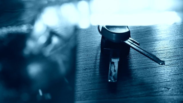 drinker takes the car keys from the table,real time