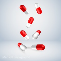 medical capsules dropping down