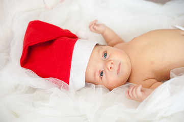christmas cute baby boy/girl in Santa's hat