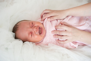 Portrait of crying baby girl/boy