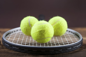 A set of tennis. Racket and ball.