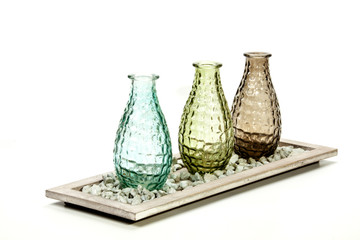 Three Decorative Glass Vases on Stand with Pebbles