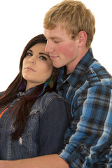 couple blue outfits close serious