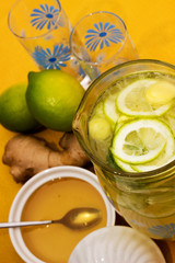 Drink with lemon, ginger and honey.