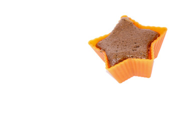 Chocolate muffins in silicone holders with form of star