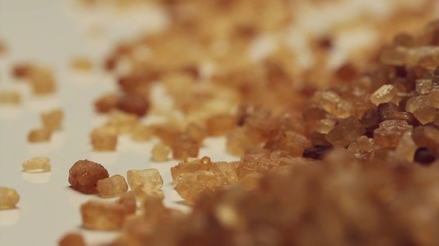 Brown sugar from sugar cane,rotating
