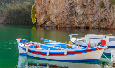 Obraz premium Traditional Greek boat at Aghios Nikolaos port