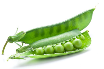 Fresh peas are contained within a pod.