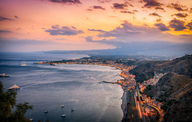 Overview of Taormina Coastline at Dusk