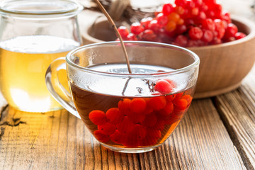 Hot herbal tea with honey and viburnum