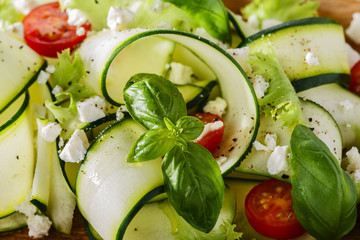 Zucchini salad with tomatoes and cheese