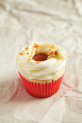 Vanilla cupcake with Salted caramel icing topping
