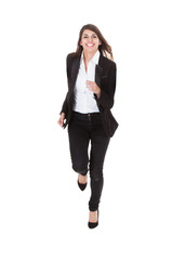 Happy Businesswoman Running Over White Background