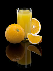 Glass of orange juice with fruit