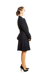 Businesswoman with protecting mask