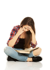 Woman sitting cross-legged