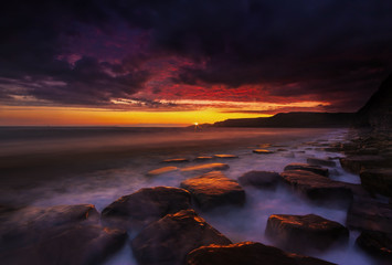 Fototapeta na wymiar Rocky Dorset Coastline at sunset