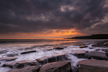 Rocky Dorset Coastline at sunset