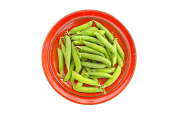 fresh pea pods in red ceramic plate