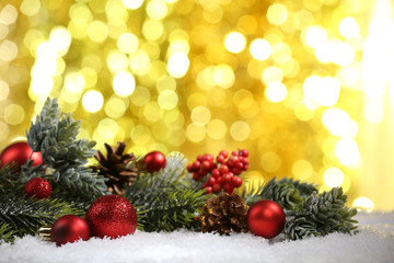 Fototapeta na wymiar Christmas composition with baubles and fir-tree