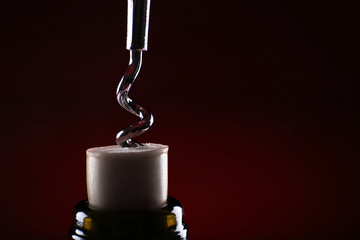 Bottle opener close-up, on dark color background